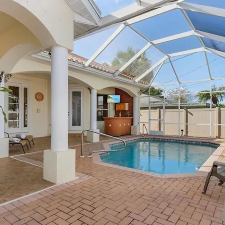 This Lovely Four-Bedroom, 3 Bath Pool Villa Is Just Minutes Away From Downtown Cape Coral